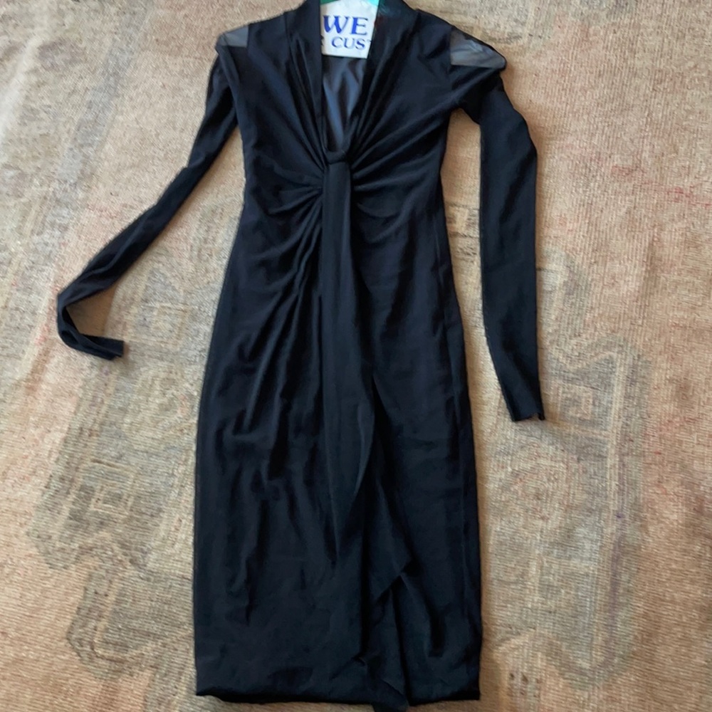 Fuzzi Italian black form fitting stretch figure flattering below knee dress